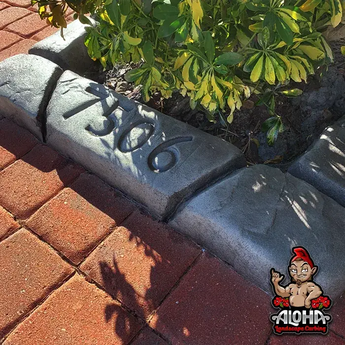 Tangier Slate curbing with the house address stamped into the face