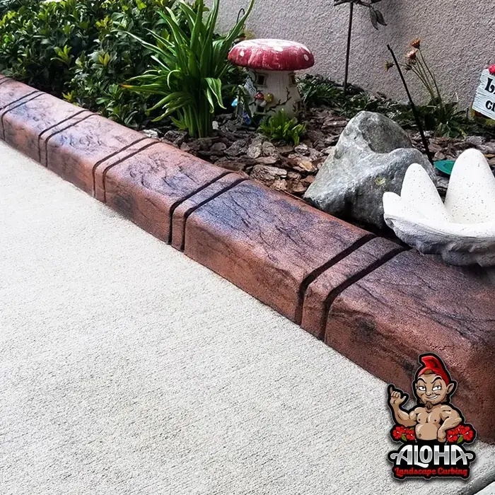 Slate Tile stamped curbing edging a flower bed
